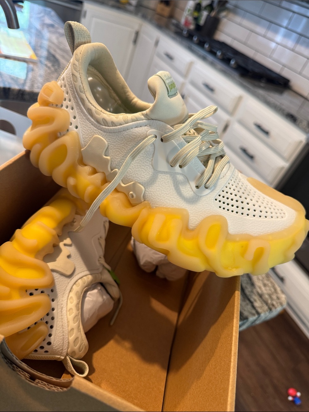 CROCS White and Yellow Ripple Sole Sneakers